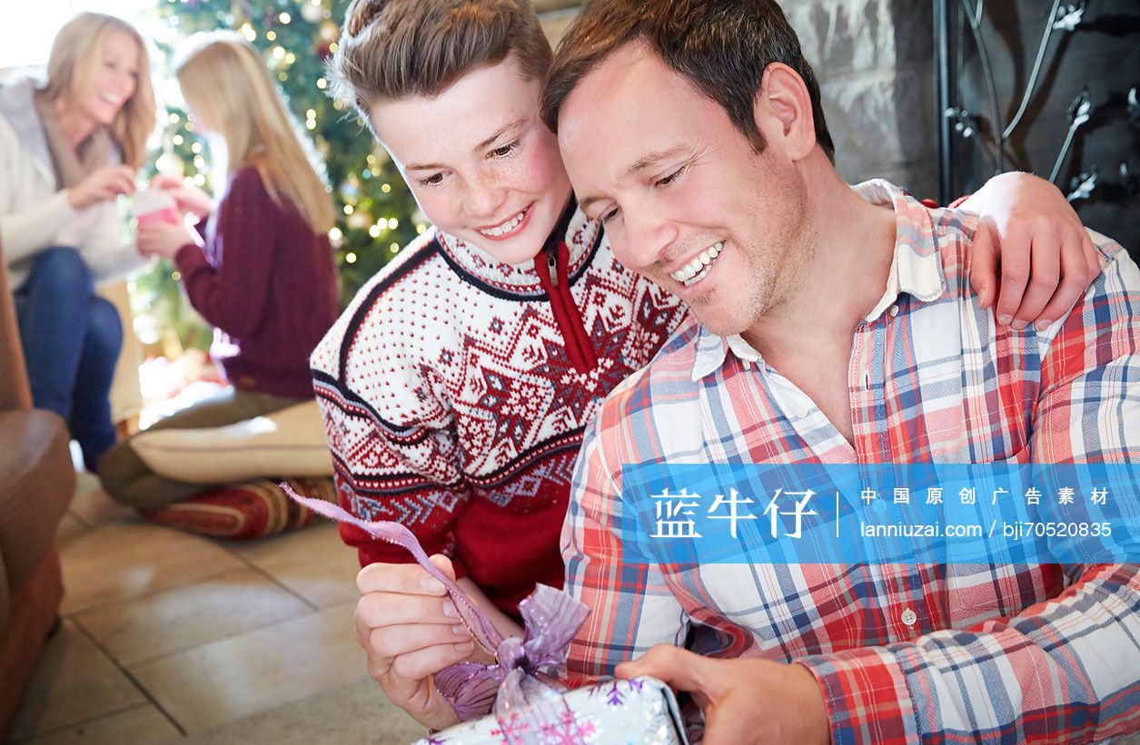 family exchanging gifts on christmas
