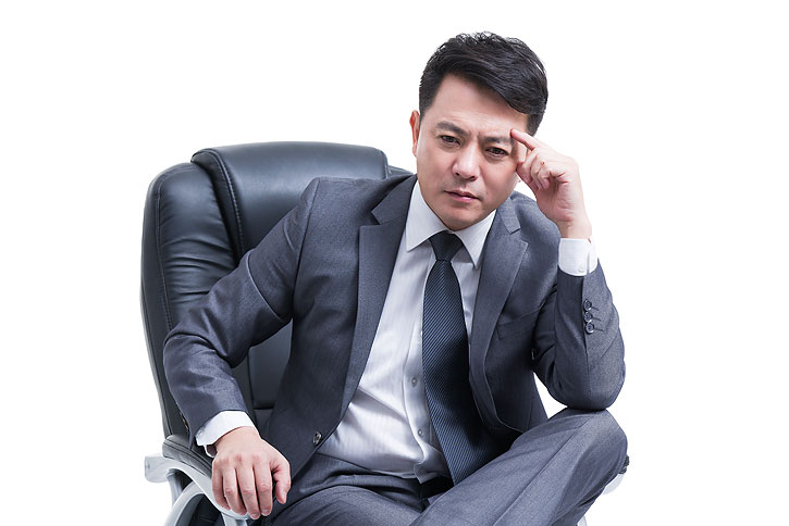 苦恼的中年商务男士