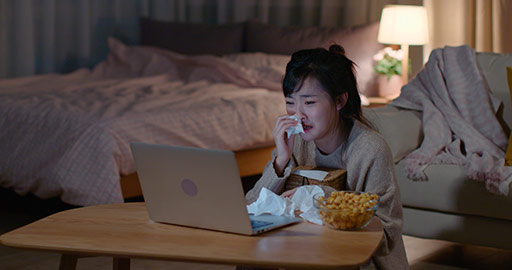 Young Chinese woman watching movie on laptop,4K