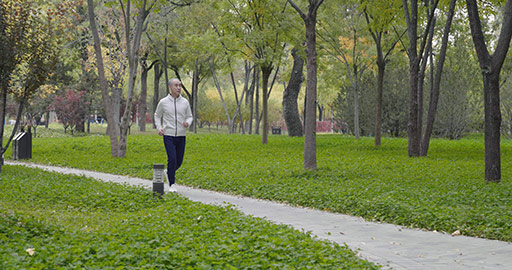 Happy senior Chinese man running in the park,4K