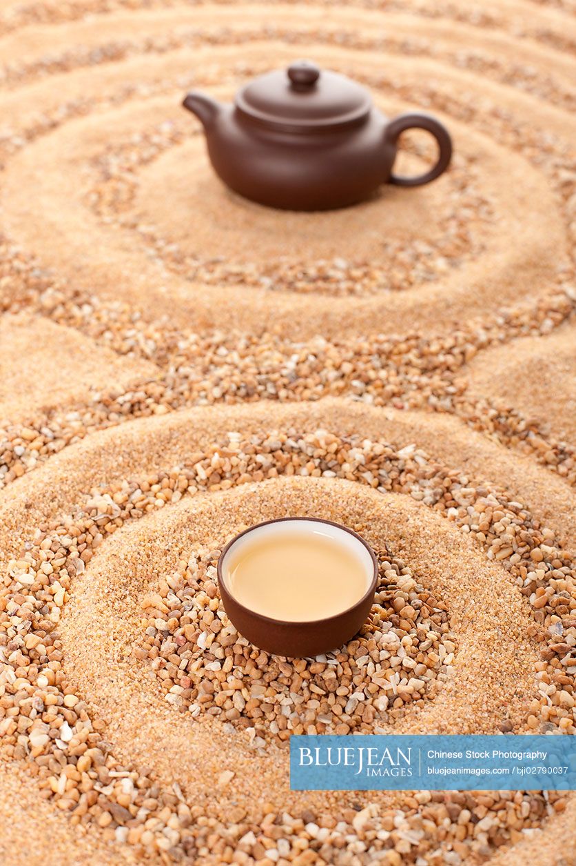 Tea set in sand