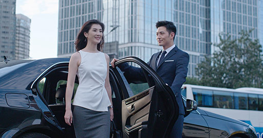 Confident Chinese businesswoman getting out of car,4K