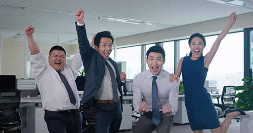 Chinese business people punching the air in office,4K