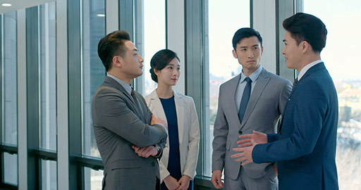 Successful Chinese business people talking in office,4K