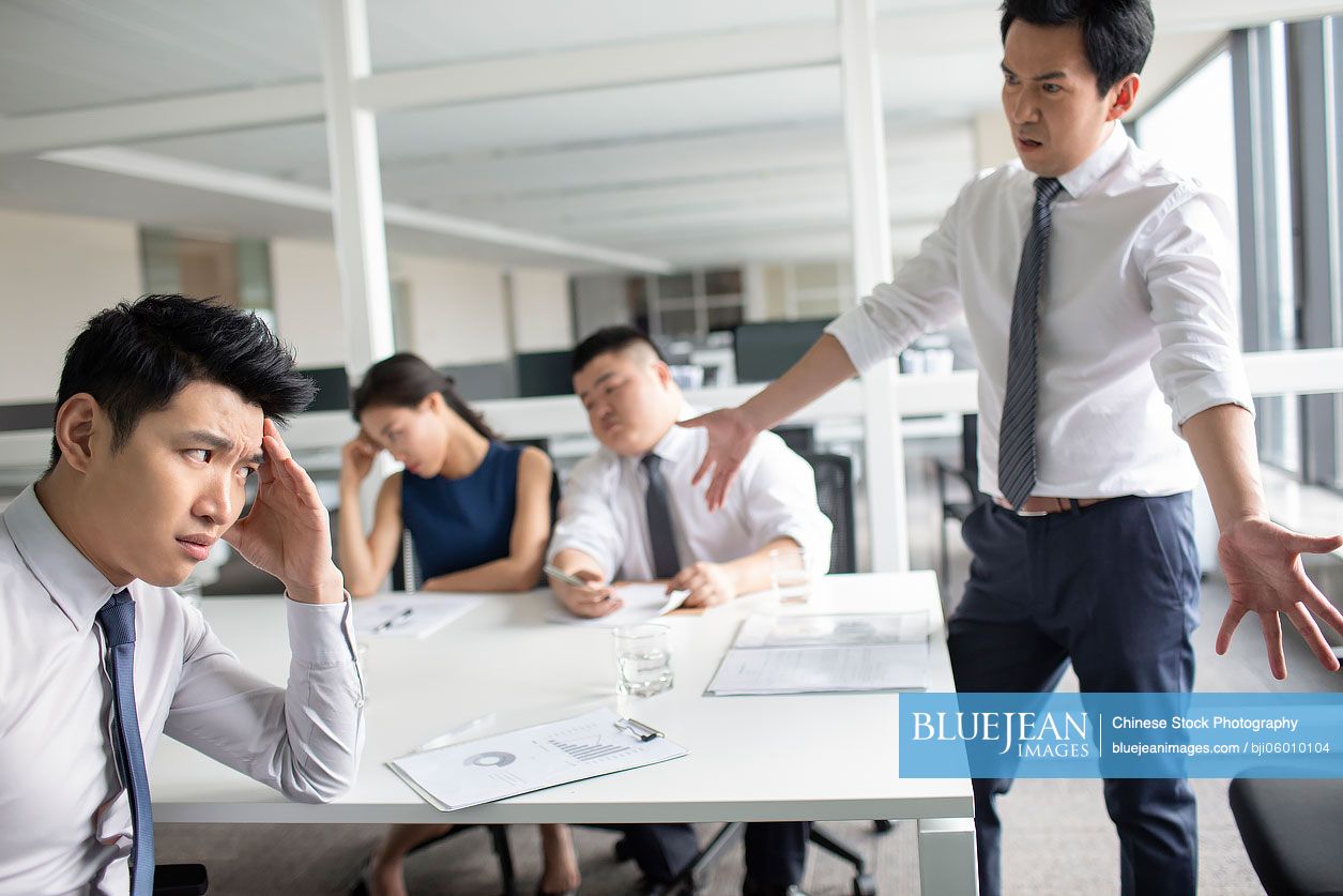 Chinese business people having a meeting