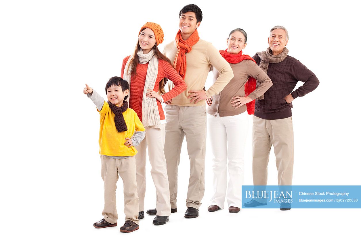 Chinese family members looking afar and pointing the front