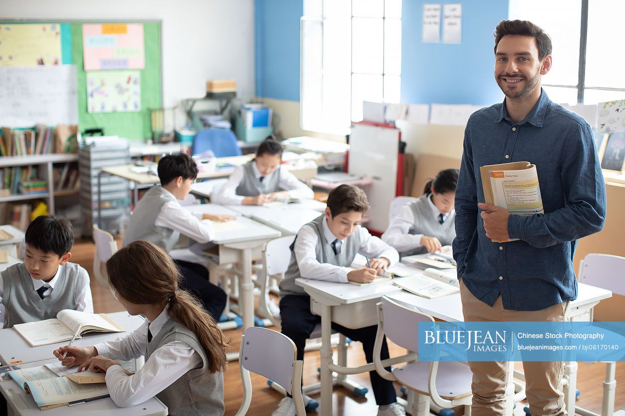 Young teacher teaching a class