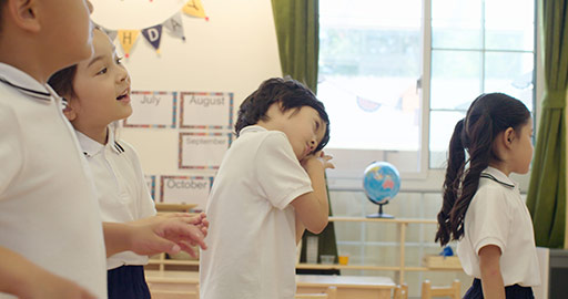 Children dancing in kindergarten classroom,4K
