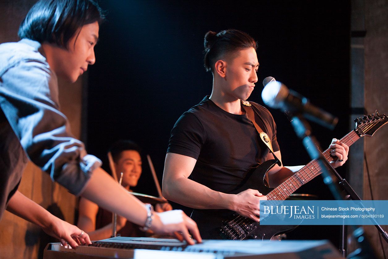 Chinese musical band performing on stage