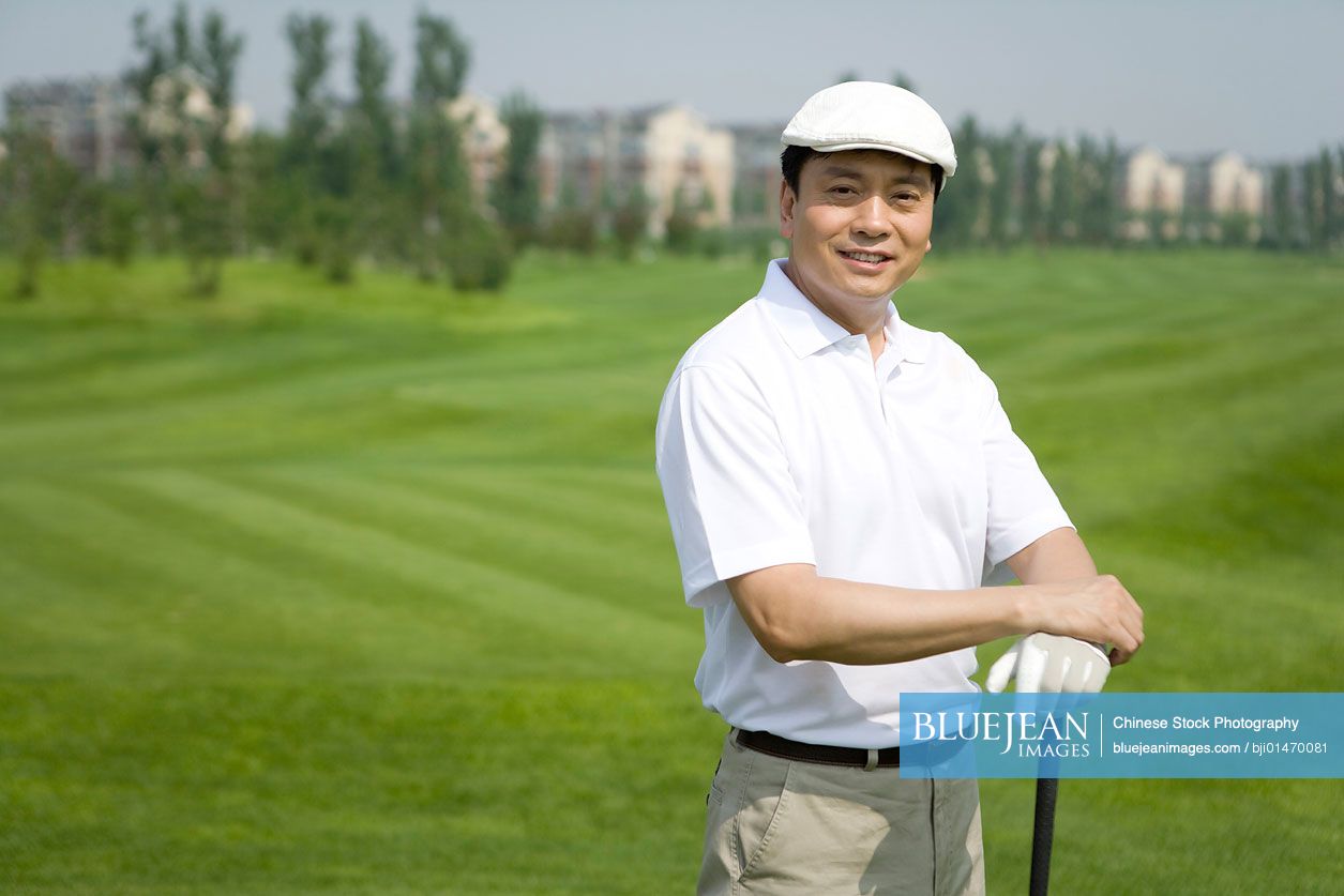 Portrait of a male Chinese golfer
