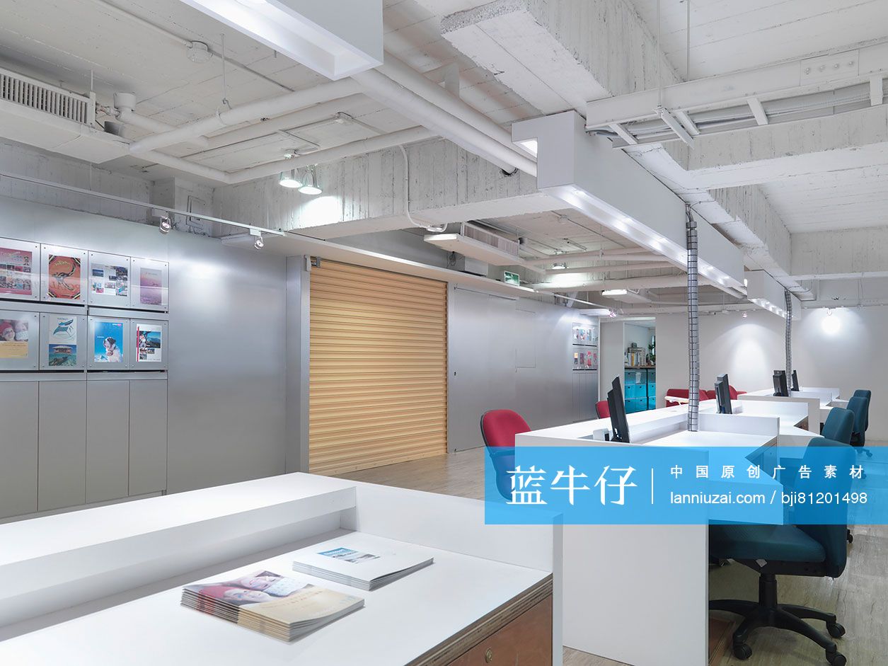 Row of desks and chairs in office