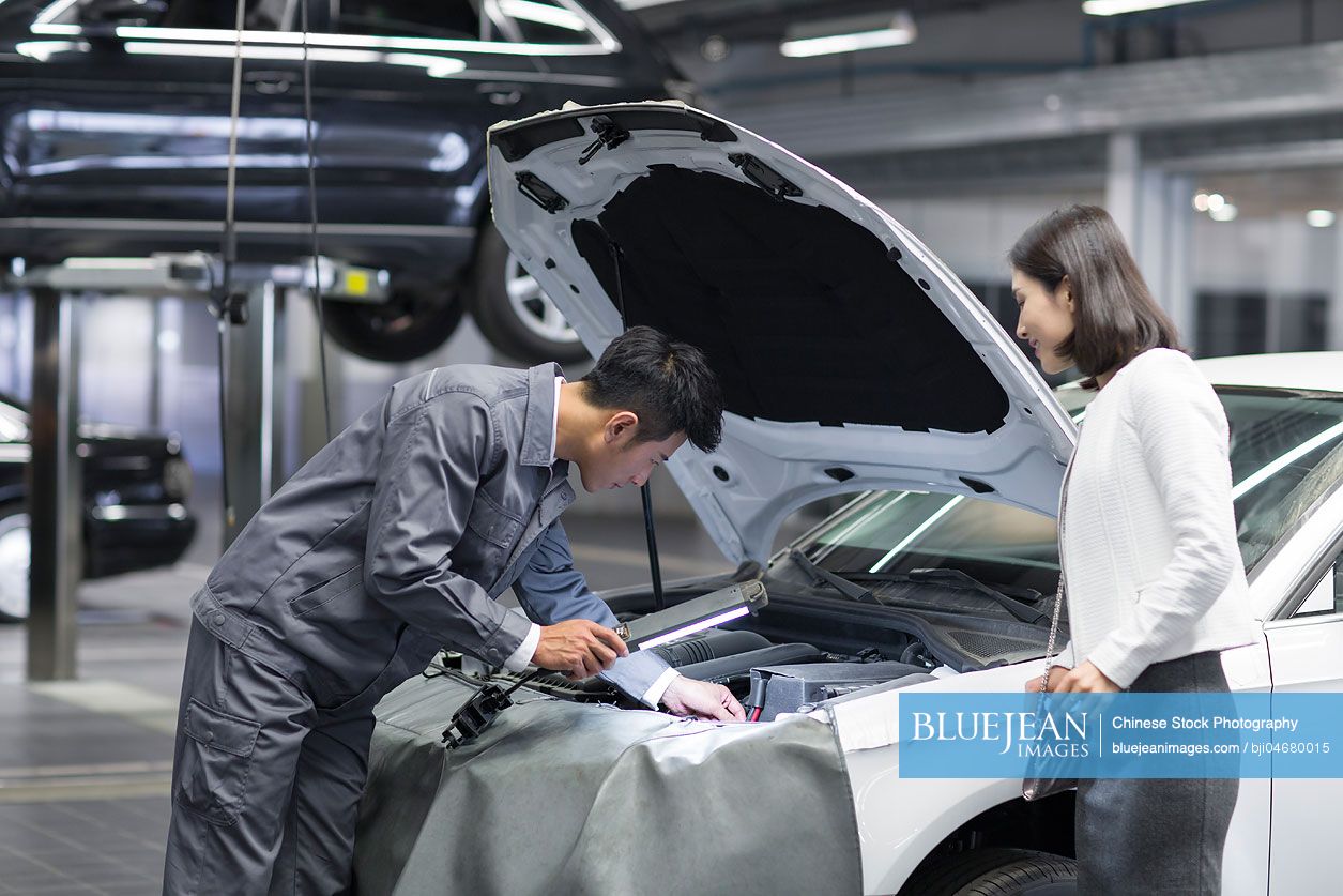 Chinese auto mechanic and car owner