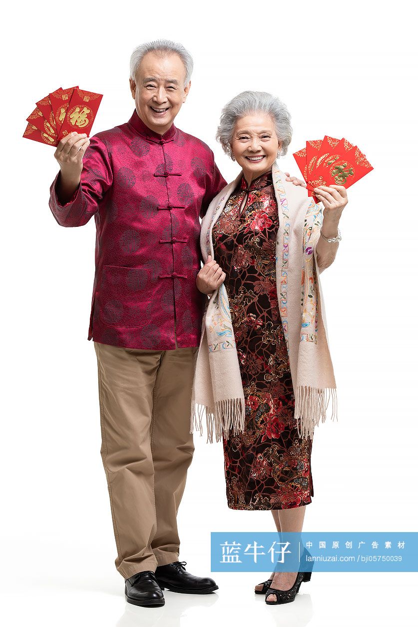 快乐的老年夫妇手拿红包
