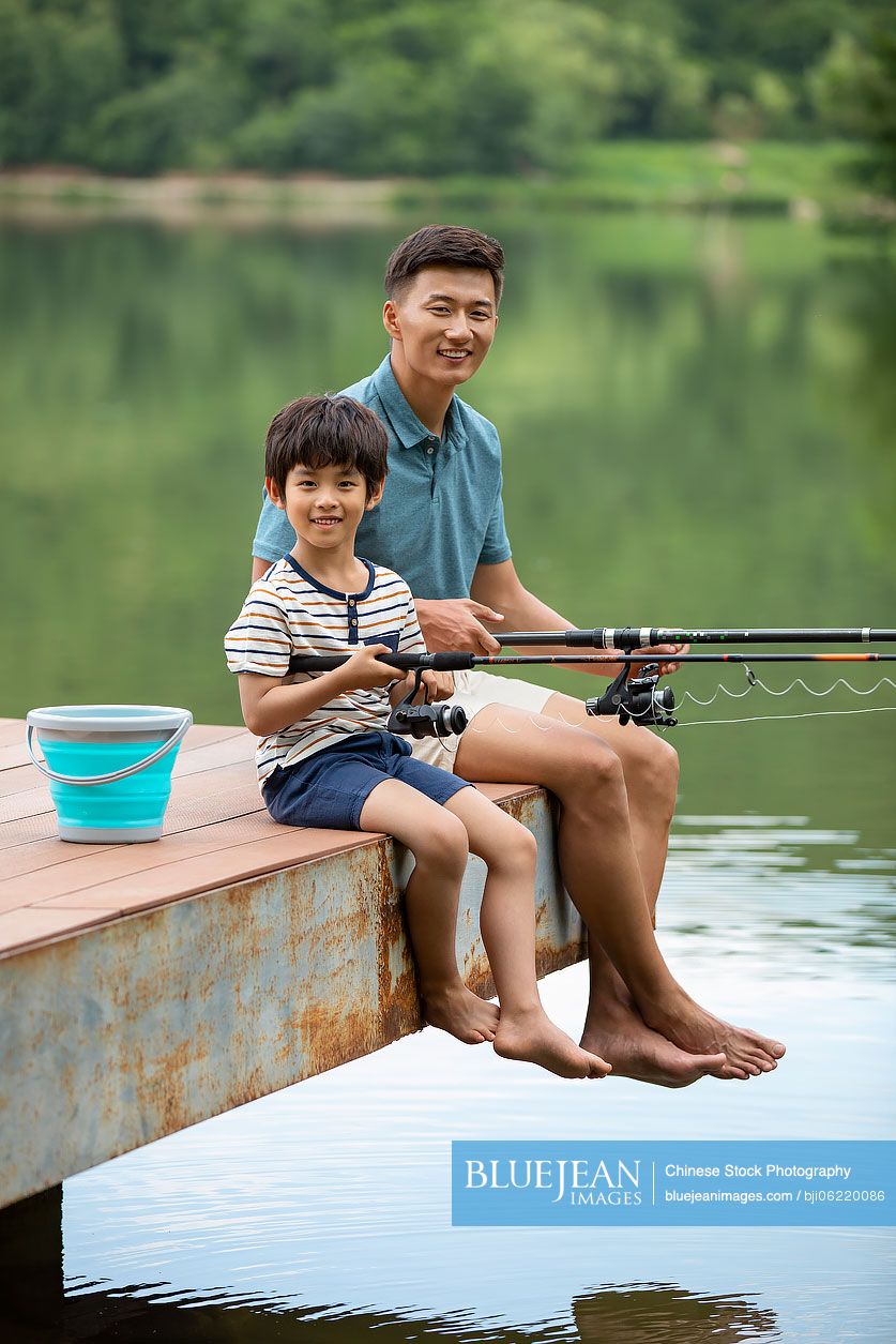 Asian boys fishing at the river, Asian boys fishing at the …