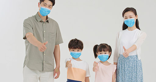 Young Chinese family wearing surgical masks,4K