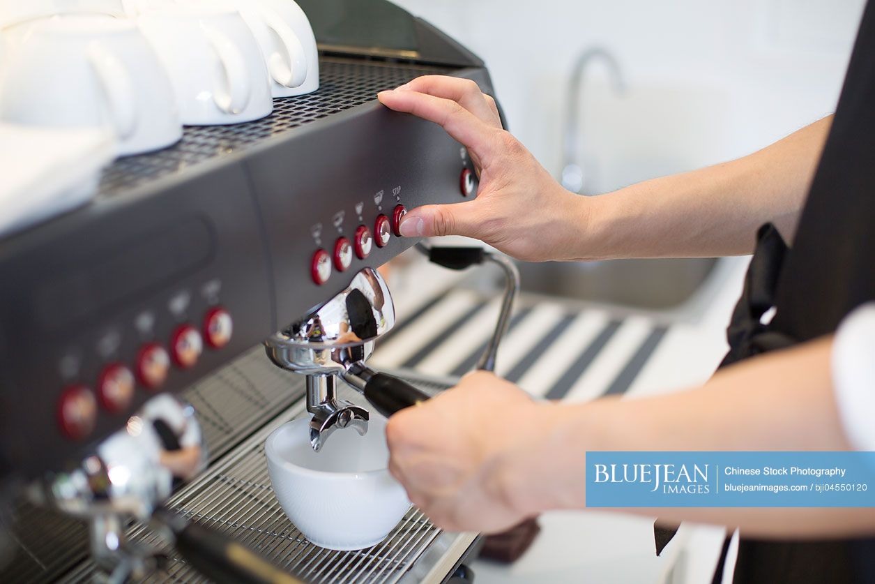 Chinese barista making coffee