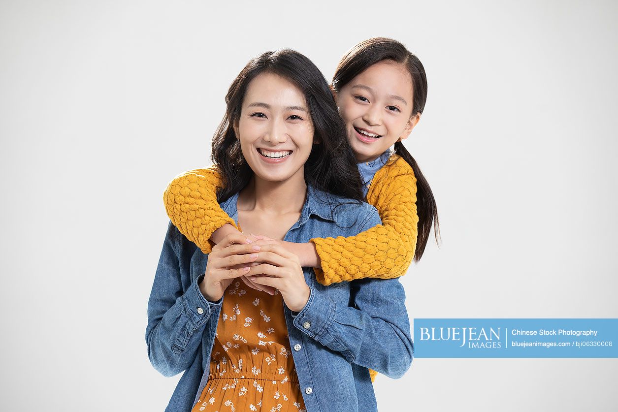 Happy Chinese mother and daughter