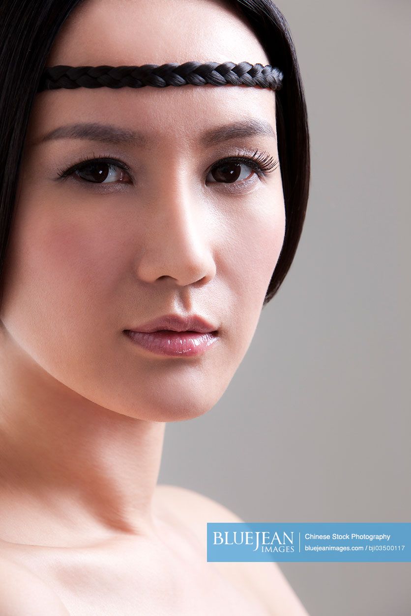 Portrait of beautiful Chinese woman with ancient hairstyle