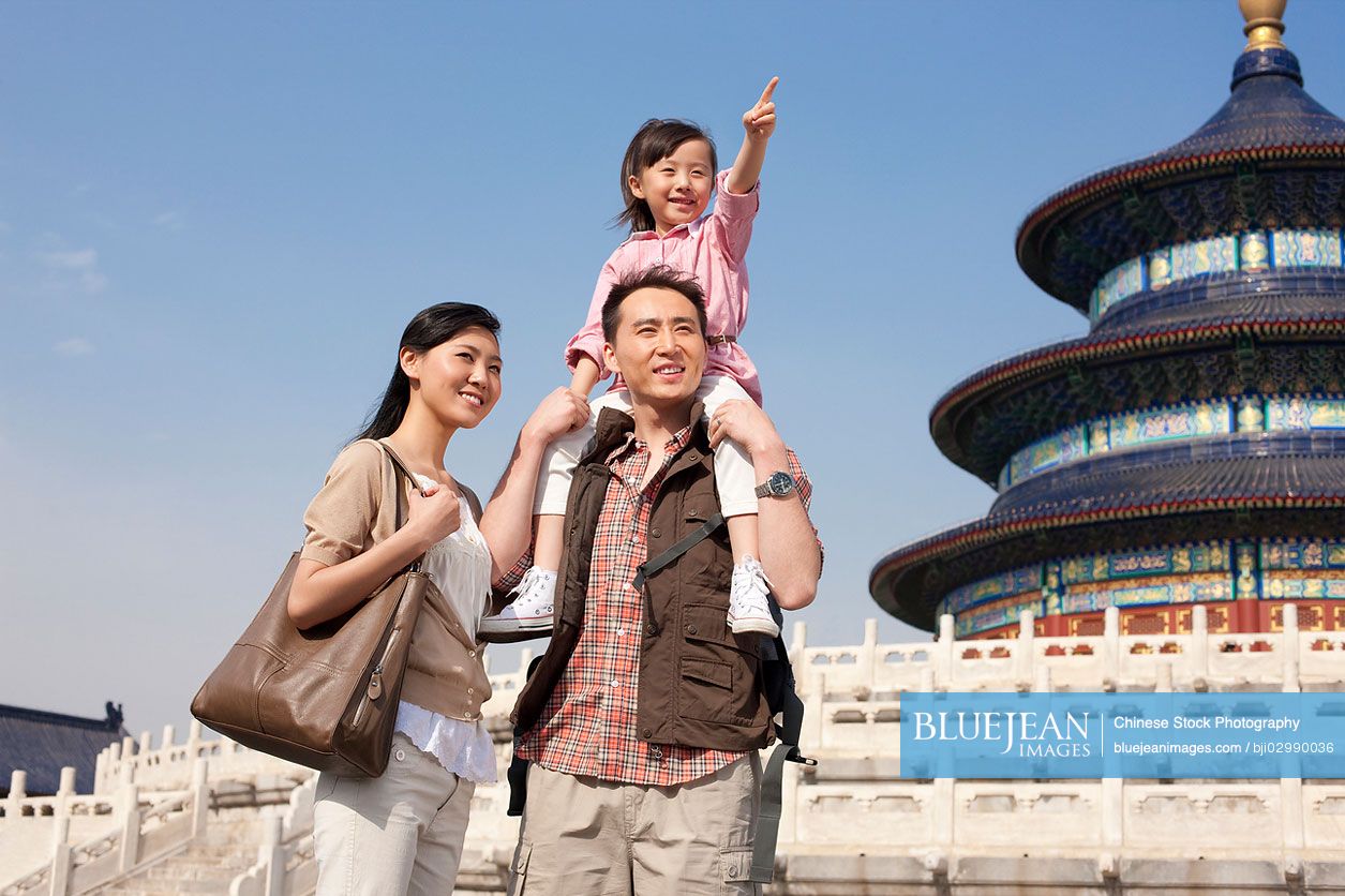 Young Chinese family travelling at Temple of Heaven in Beijing, China