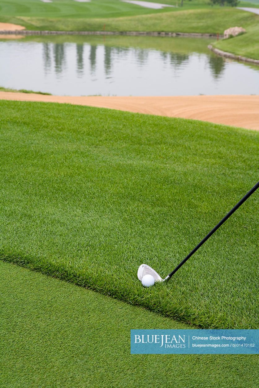 Close-up of chipping golf ball