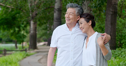 Happy senior Chinese couple in park,4K