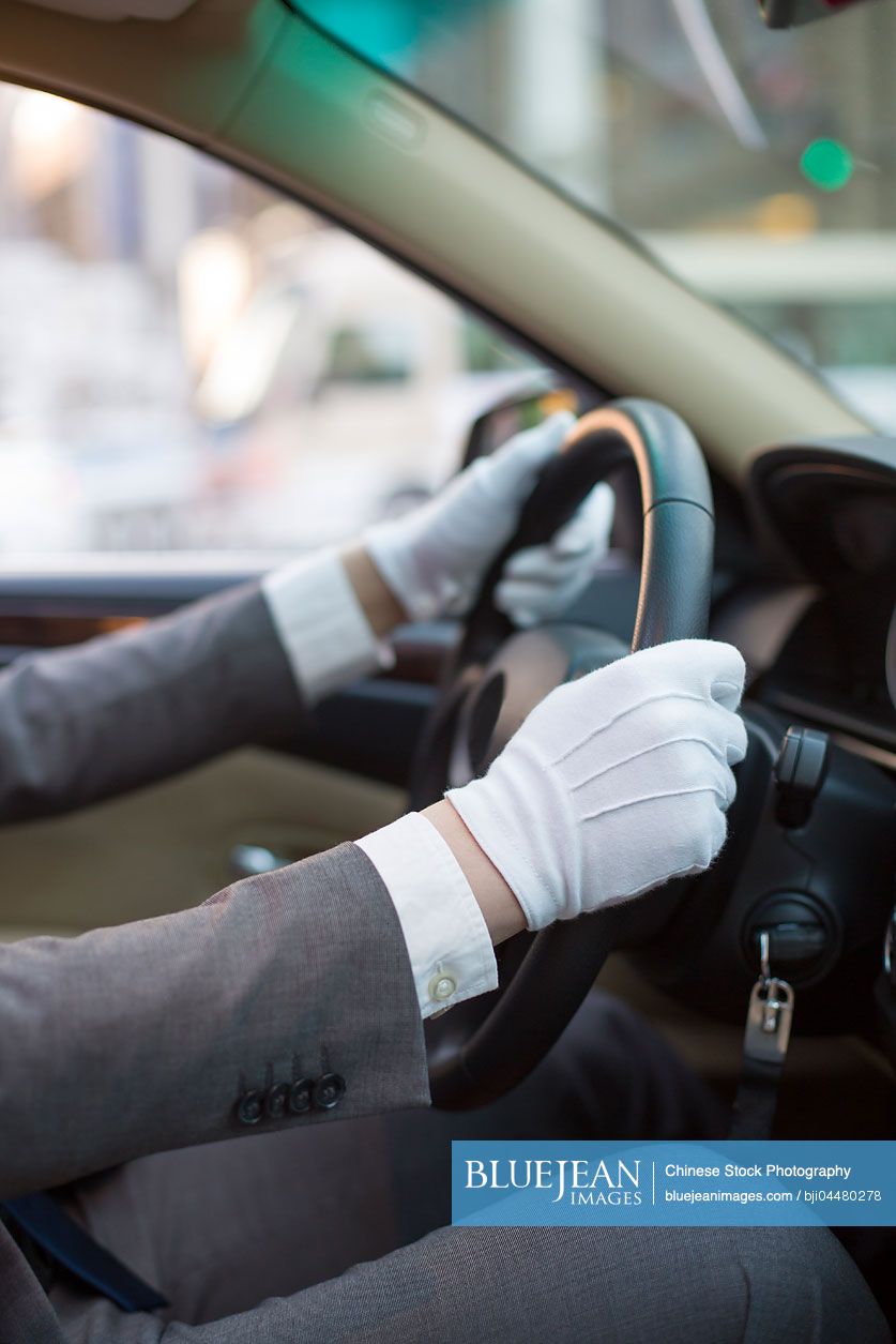 Chinese chauffeur driving car