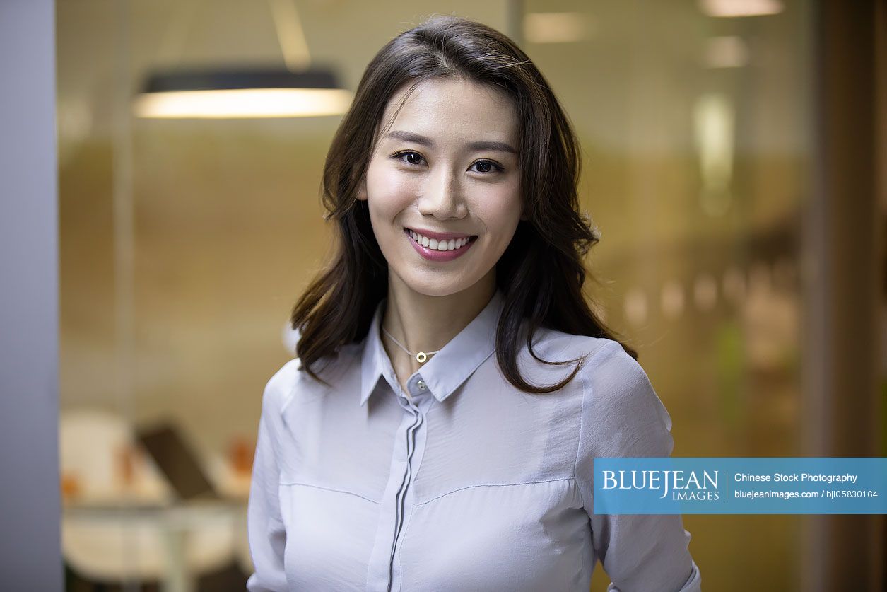 Portrait of confident young Chinese businesswoman 