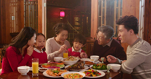Happy Chinese family eating dinner for Chinese New Year,4K