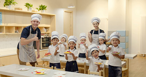 Children learning cooking in kindergarten classroom,4K