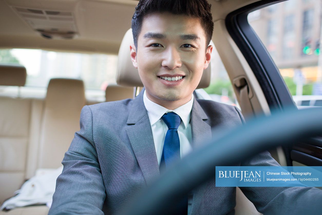 Chinese chauffeur driving car
