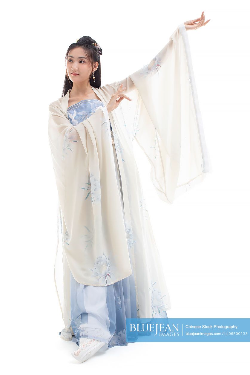 Beautiful young Chinese woman in ancient costume dancing-High-res stock ...