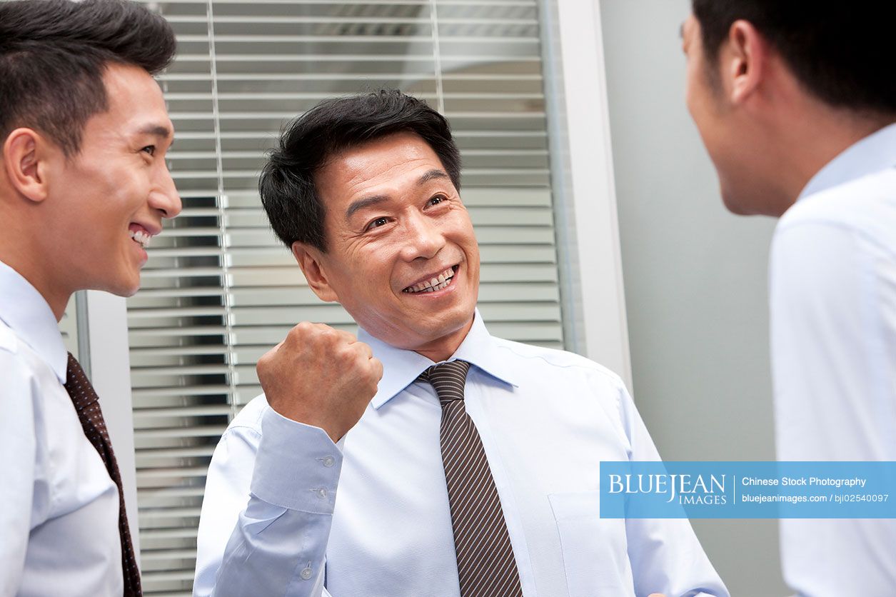 Chinese colleagues talking together