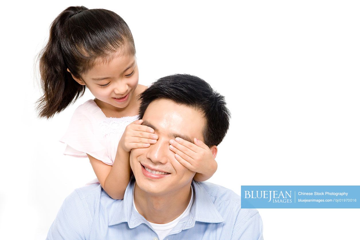 Chinese father and daughter playing