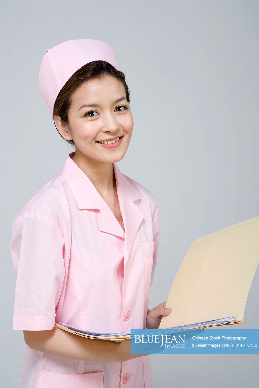 Chinese nurse in pink uniform