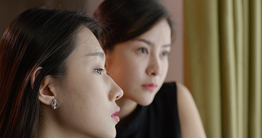 Chinese makeup artist applying makeup on model,4K