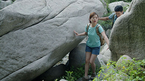 Happy young Chinese couple hiking outdoors,4K