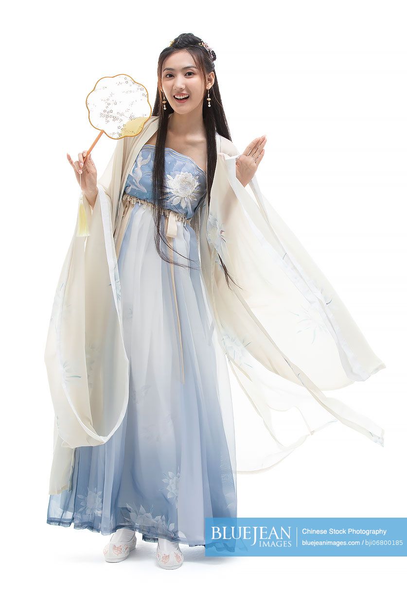 Beautiful young Chinese woman holding a round fan