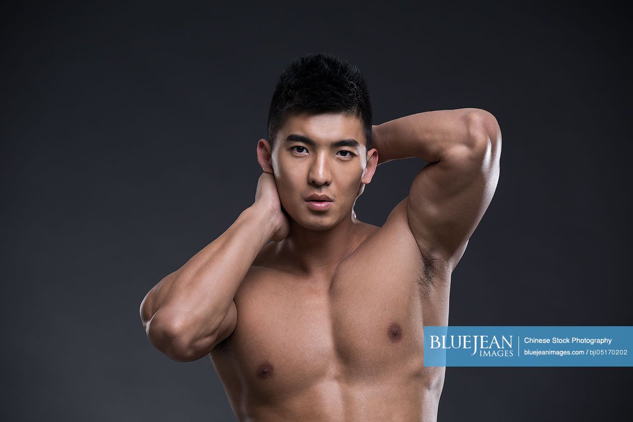 Portrait of young Chinese muscular man
