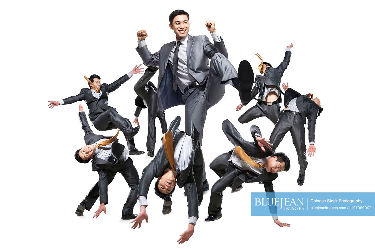 Chinese businessman fighting a group of men