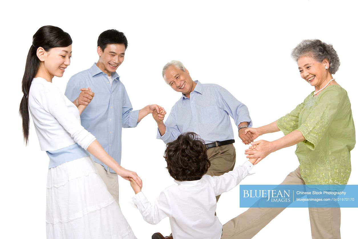 Chinese family in a circle holding hands