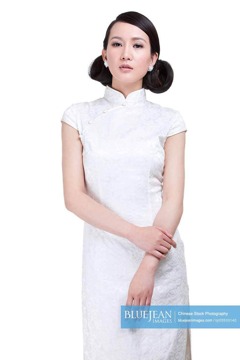 Beautiful young Chinese woman in traditional cheongsam