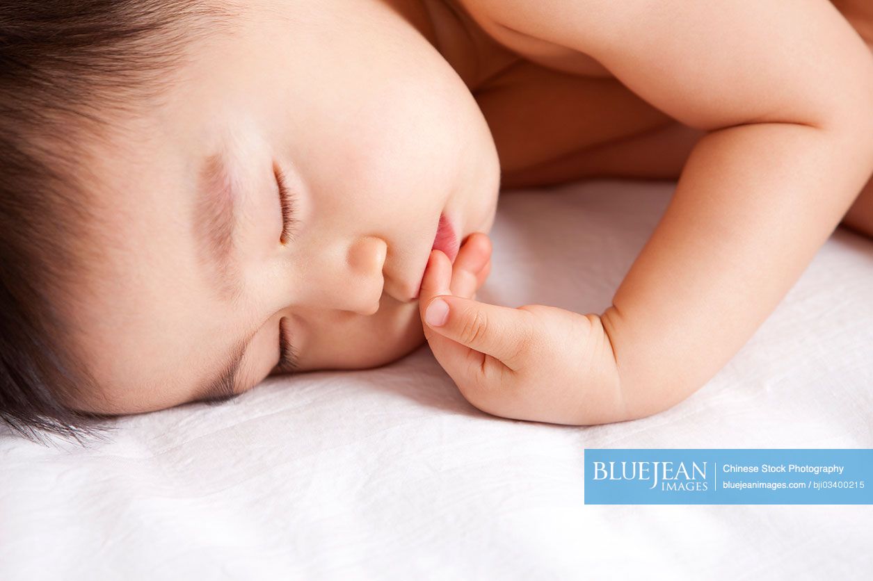 Adorable Chinese baby boy in sweet dreamHighres stock photo for download
