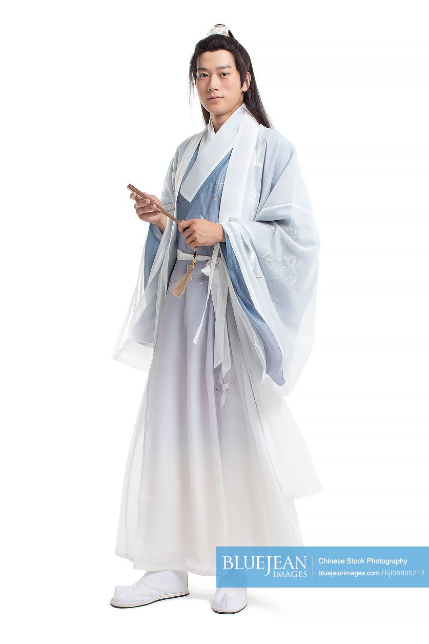 Young Chinese Man In Ancient Costume Holding A Fan High res Stock Photo 