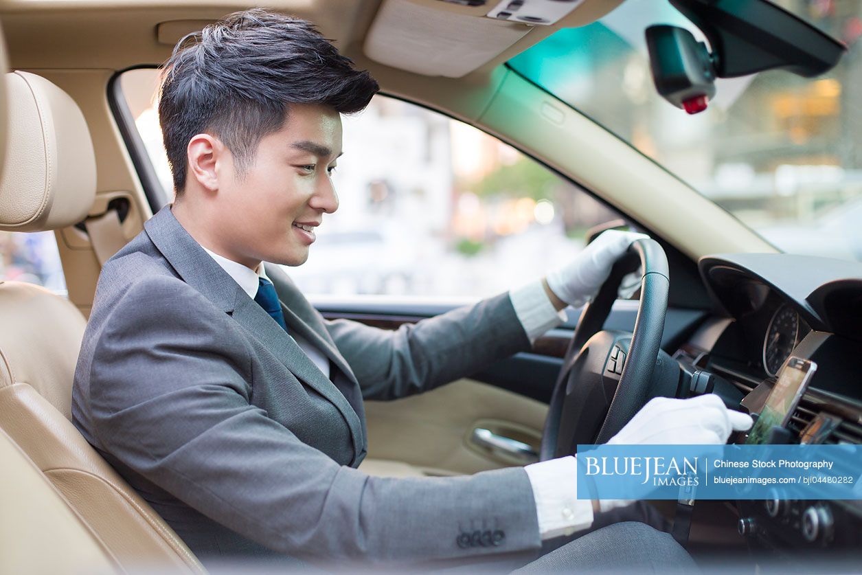 Chinese chauffeur driving car