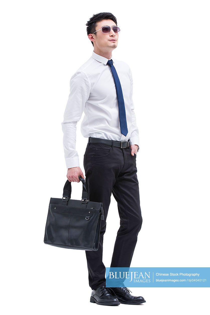 Fashionable Chinese businessman on the move