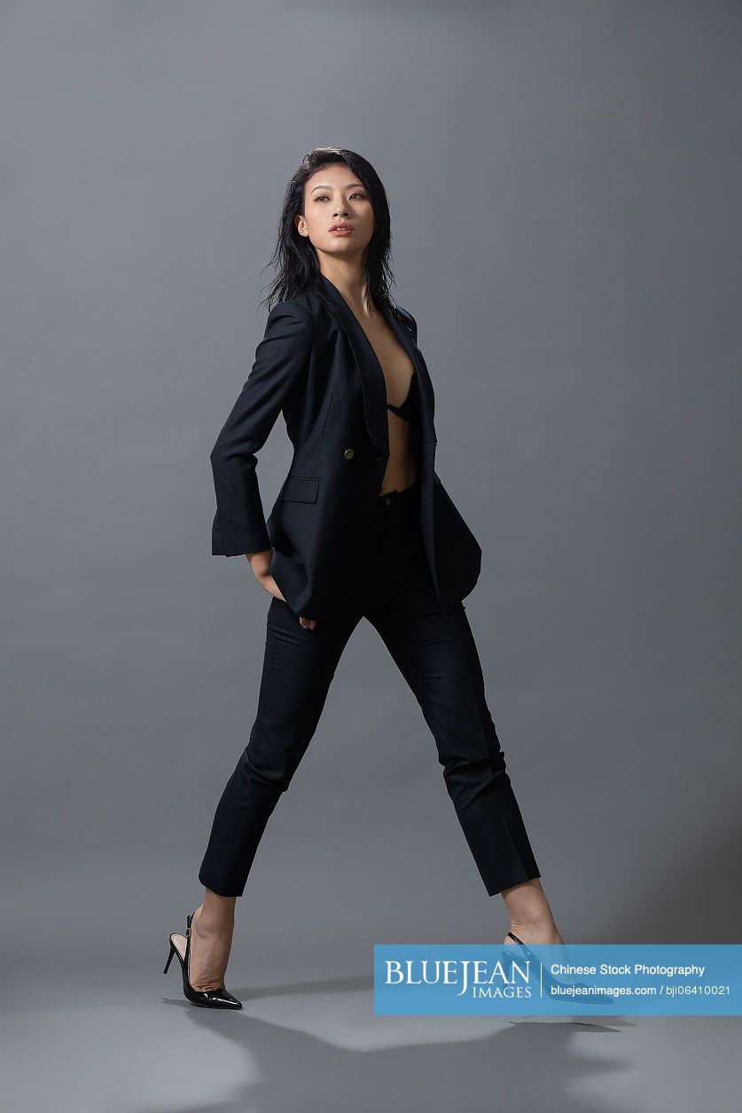 Cool young Chinese woman in suit