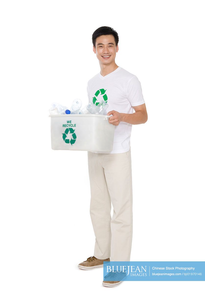 Mid-Adult Chinese man recycling