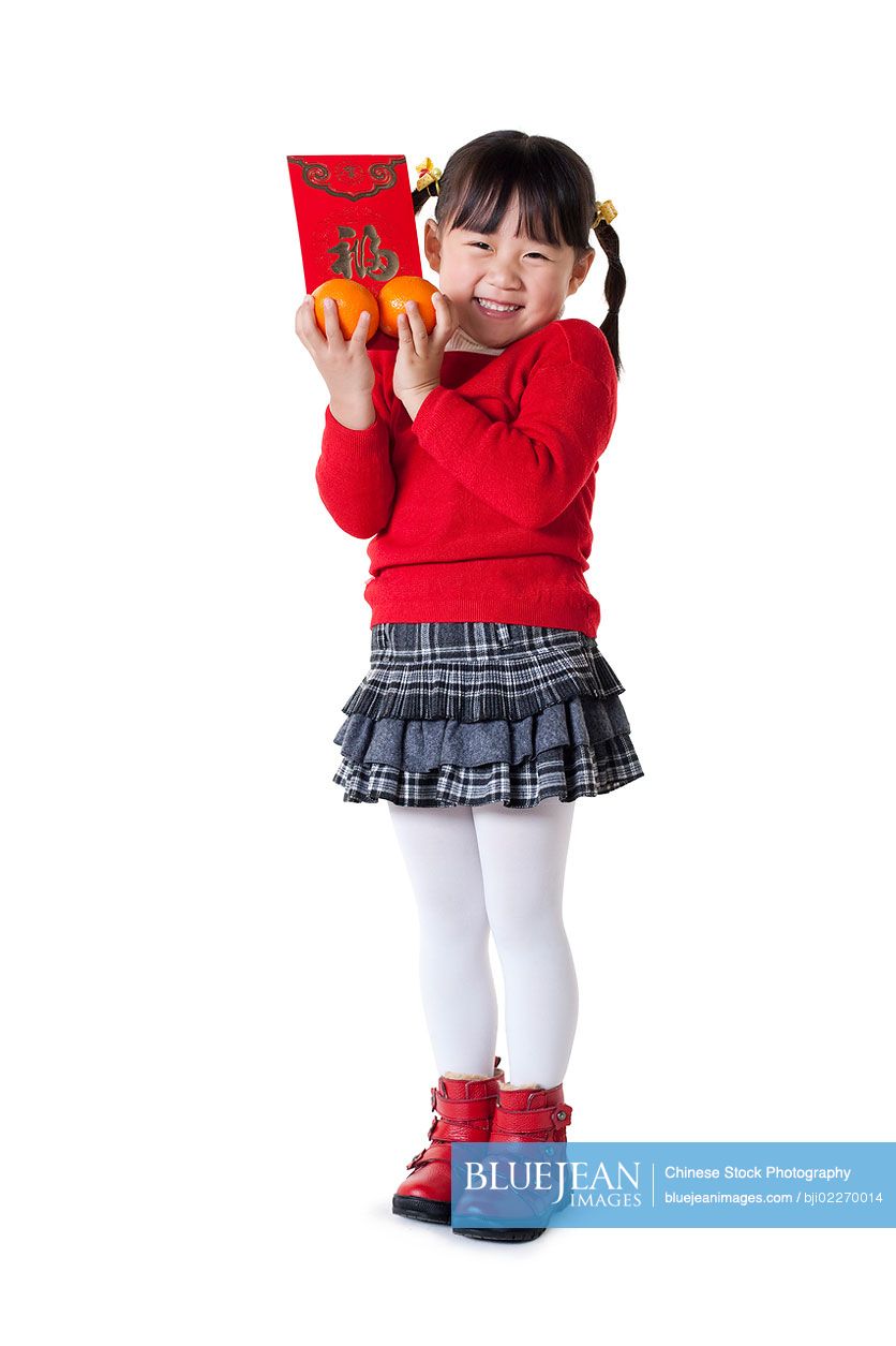 Chinese girl holding red envelope