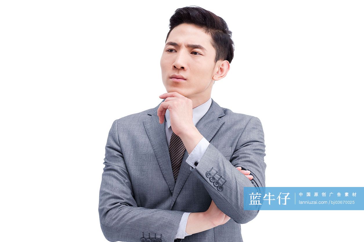 商务男士手托下巴思考