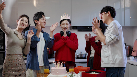 Young friends celebrating a birthday together